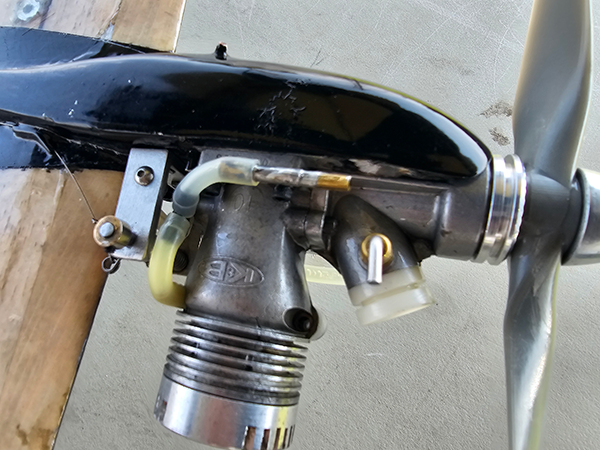 A top view of the K&B 4011 engine, showing shutoff installation and an APC propeller.
