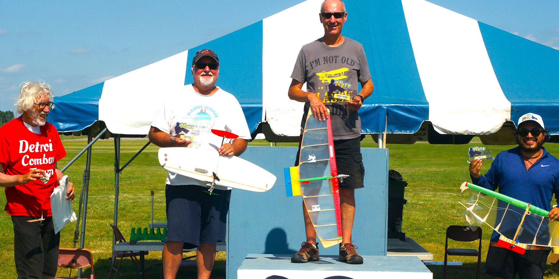 The podium for 1/2A Combat. L-R: Ed Brzys (fourth), Mike Evans (second), Leonardo Silva (first), and Ariel Quezeda (third).