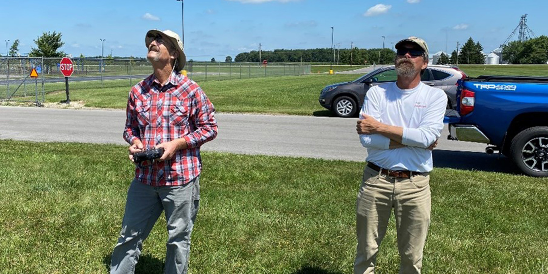 Ed Dumas and Dave Smith sniffing for some air in the school yard.