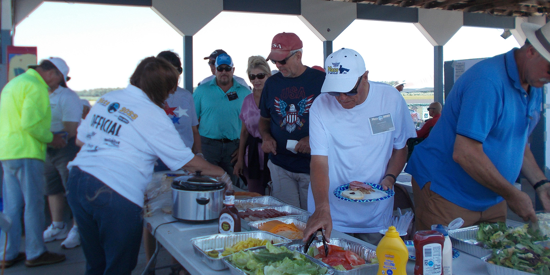 7.	Michelle Lee and Colleen Gilbert help out with the chow line. My thanks to them for getting lunch ready.