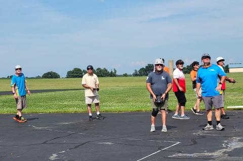 There are two pilots for each plane: the pilot and his teammate/caller. In 4-plane heats it can get quite hectic during the intensity of a race. There are two pilots for each plane: the pilot and his teammate/caller. In 4-plane heats it can get quite hectic during the intensity of a race.