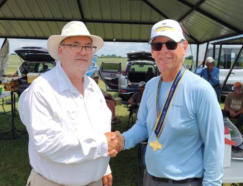Mike Lachowski receives his gold medal in Unlimited. Mike Lachowski receives his gold medal in Unlimited.