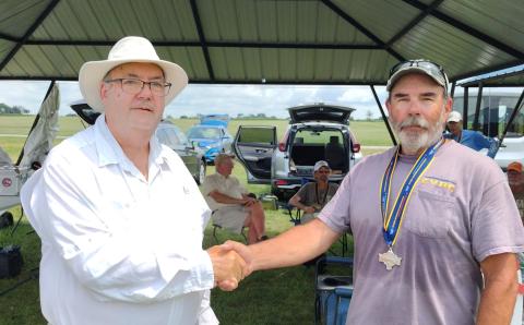 Pete Russell gets his silver medal in Unlimited. Pete Russell gets his silver medal in Unlimited.