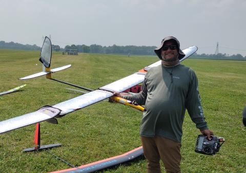 Ryan Woebkenberg and his well sun-screened sailplane. Ryan Woebkenberg and his well sun-screened sailplane.