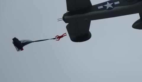 Lynn Boss ejected a parachute crewman from the bomb bay of the B-25.