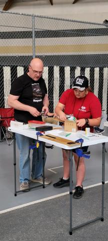 Chuck Andraka (L) and Anjulie Sorbello getting set up. Chuck has once again brought a large contingent of Juniors from Albuquerque.