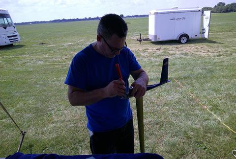 Jeff Gitchel preparing his F2A/FAI plane for a flight. He achieved a personal best flight speed of 266.8 kph (165.85 mph). Way to go Jeff! Keep up the great effort.
