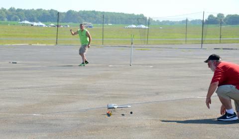 Bill Hughes launching Chris Montagino's 21 Sports Speed. Photo by Warren Gregory.