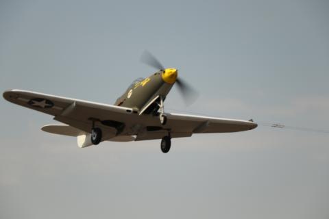 Steve Kretschmer flying the P-39 with the gear down.