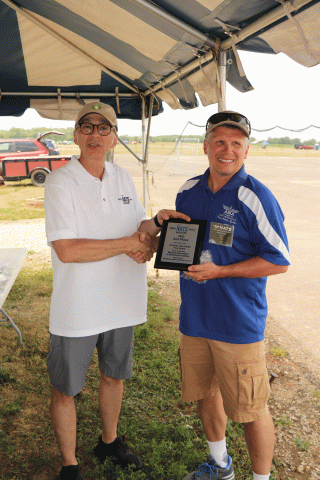 James Satawa with 2nd place Fun Scale award.