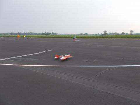 Junior contestant Gabriel Alimov taking off on an official