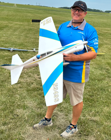 Dan Kane with his Bob Smith Miss DARA II with a side exhaust K&B .40.