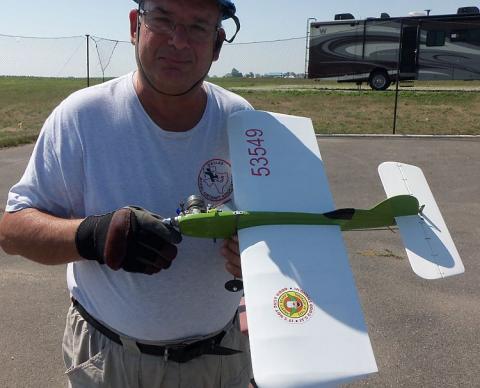 Mike Greb holding Bill Bischoff's Clown racer.