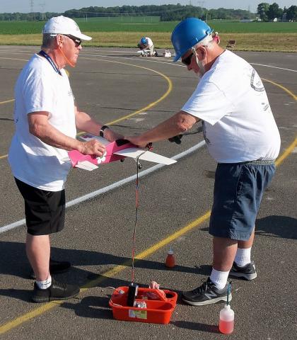 Paul Gibeault and Mike Hazel prepping for a race.