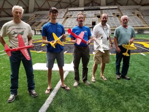 Competitors hold their planes.