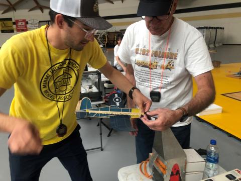 A tense moment as Jonathan Nunez and father George prep his tightly wound Corsair for the Mass Launch. 